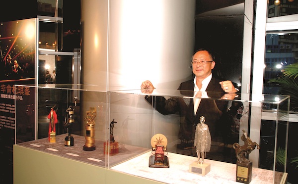 13 June 2008: ‘Meeting Johnnie To: Film Awards Donation Ceremony cum Seminar'. A photo of Johnnie To and his film award statuettes.