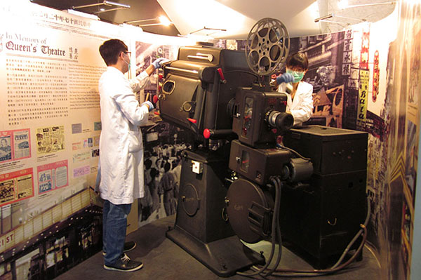 Cleaning a carbon arc-lamp film projector donated from Queen's Theatre